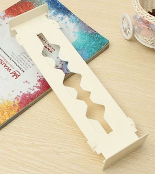 Obrázek Nastavitelná přepážka do šuplíku