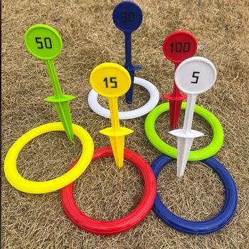 Obrázek z Hra házení kroužků s kolíky do země 